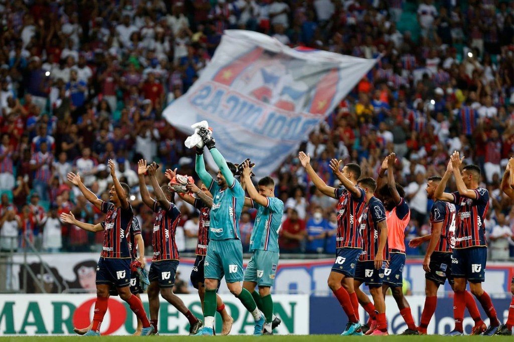 Players from Brazilian team Esporte Club Bahia salute fans after game