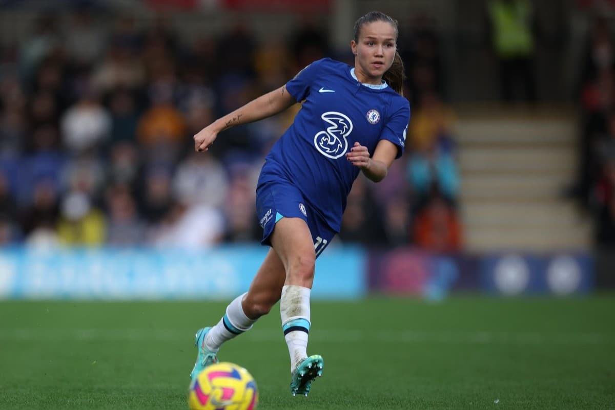 Chelsea player Guro Reiten completes pass during game