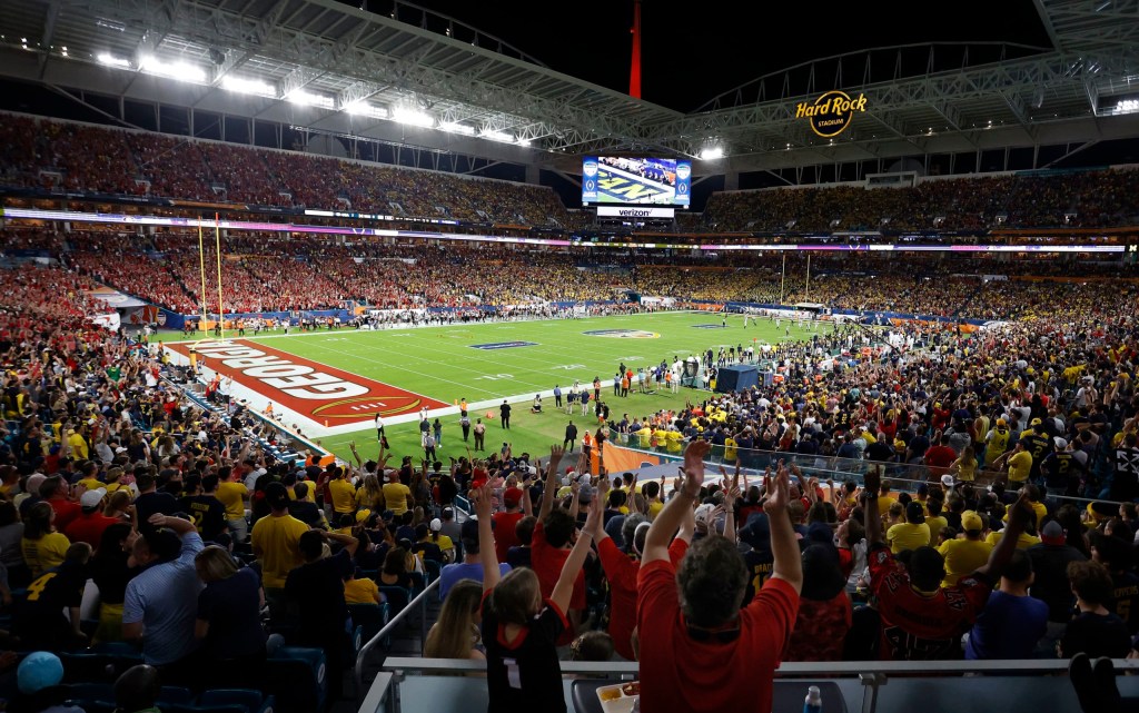 Fans cheer on players during match-up between Georgia and Michigan during 2021 Orange Bowl at Hard Rock Stadium