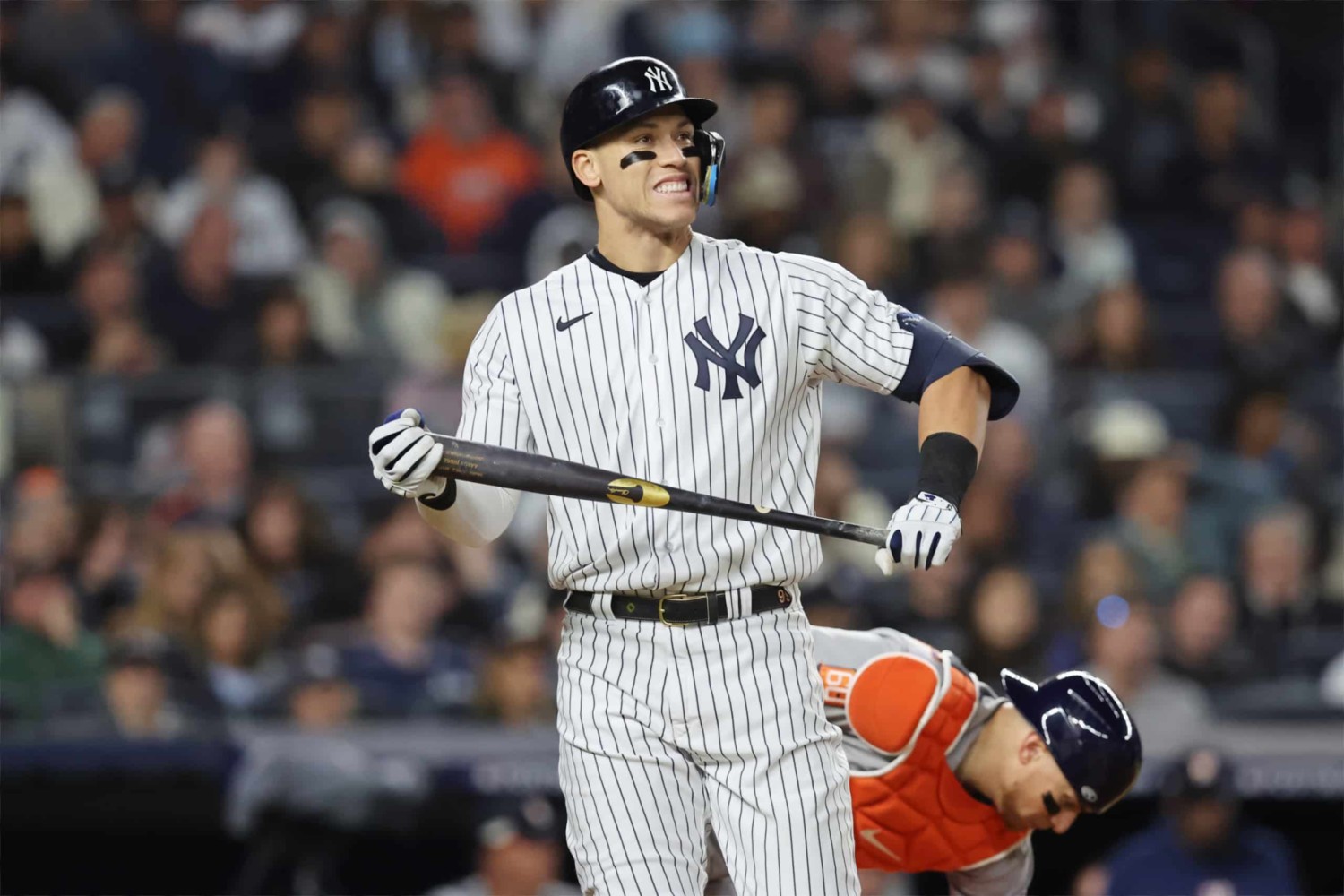 Yankees player Aaron Judge grimaces after an at-bat