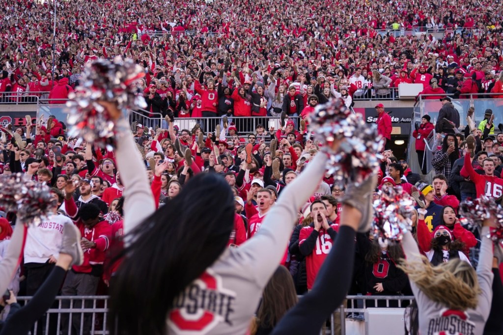 Ohio State cheerleaders in front of fans