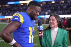 Los Angeles Rams player Van Jefferson talks to reporter on sideline