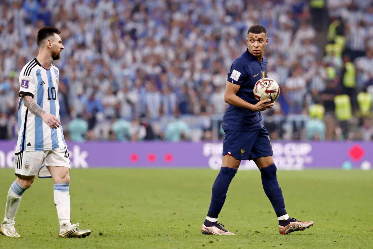 Lionel Messi and Kylian Mbappe argue during World Cup final