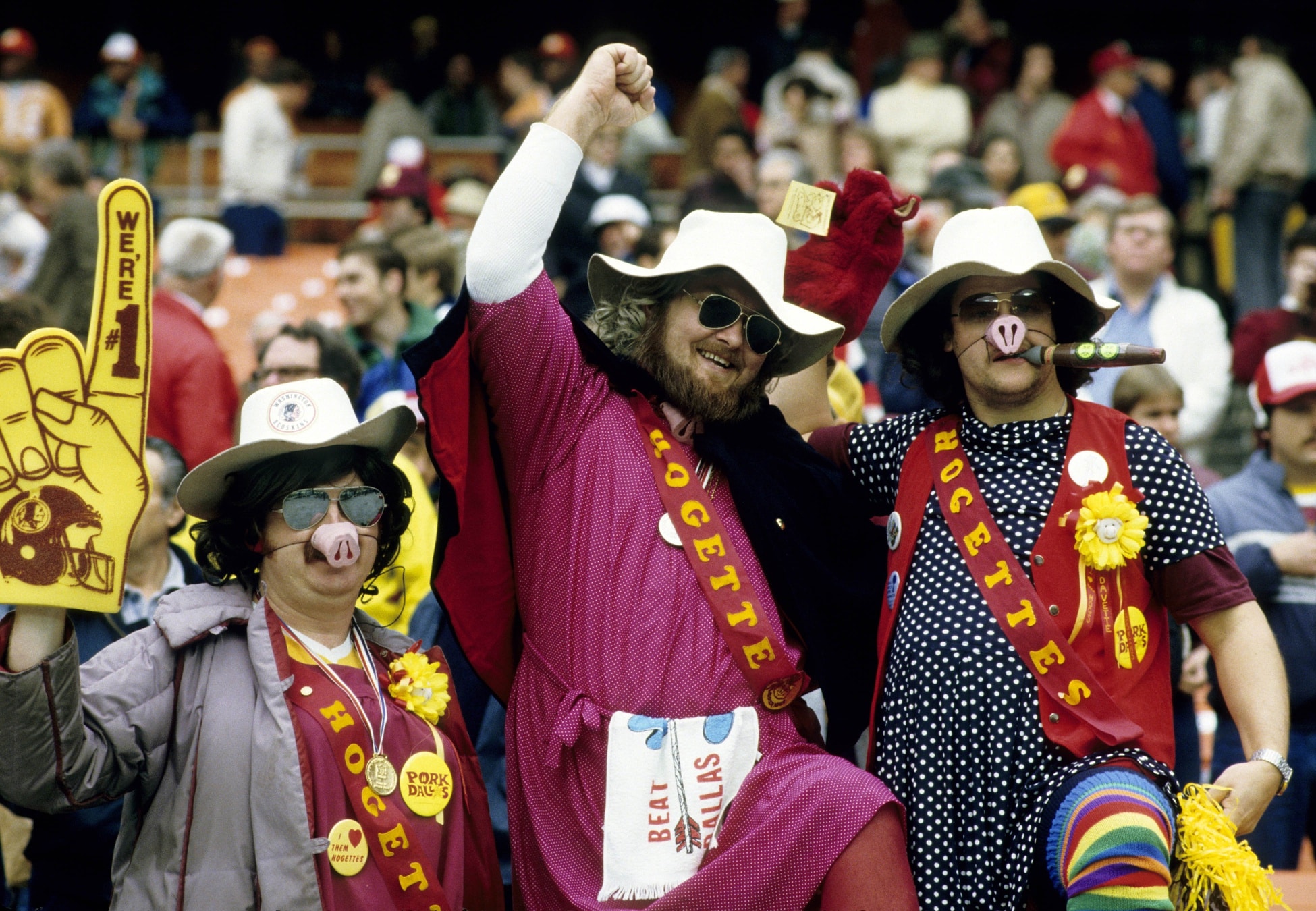 Washington Commanders fans wearing hog costumes