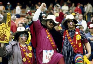 Washington Commanders fans wearing hog costumes