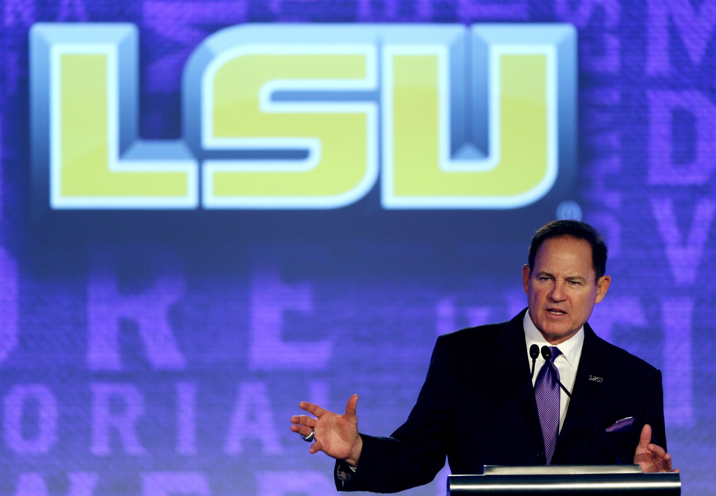 Former LSU head football coach Les Miles speaking at SEC Media Day