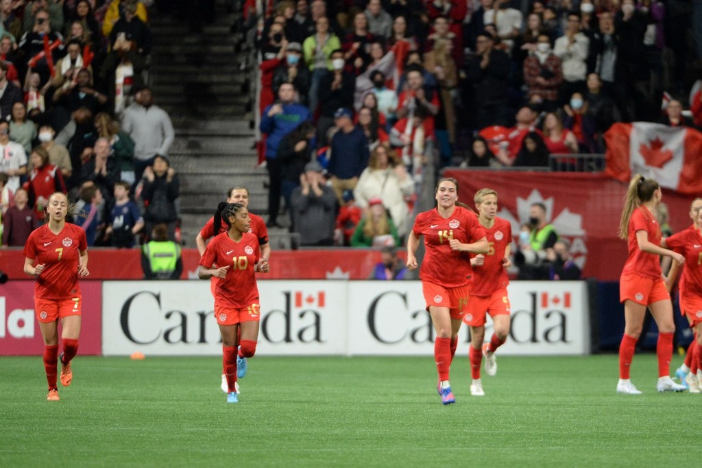 The Women's Canadian National Team shown together on field during a home match.