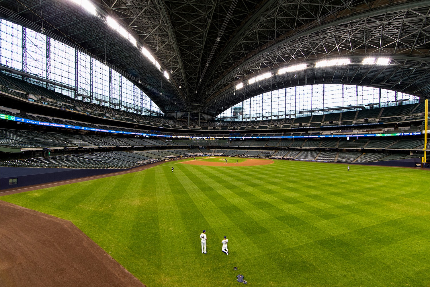 A general view of the Milwaukee Brewers warming up at American Family Field.