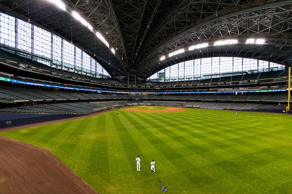 A general view of the Milwaukee Brewers warming up at American Family Field.
