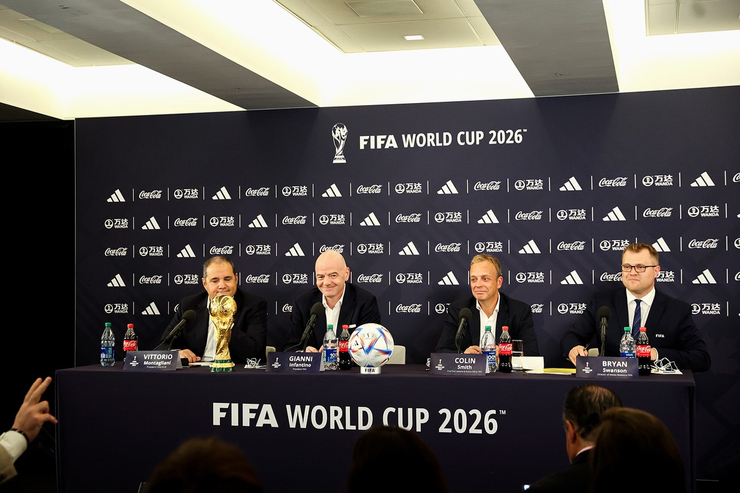 FIFA executives sit at a press conference for the World Cup 2026, which will be co-hosted by the U.S., Canada, and Mexico.