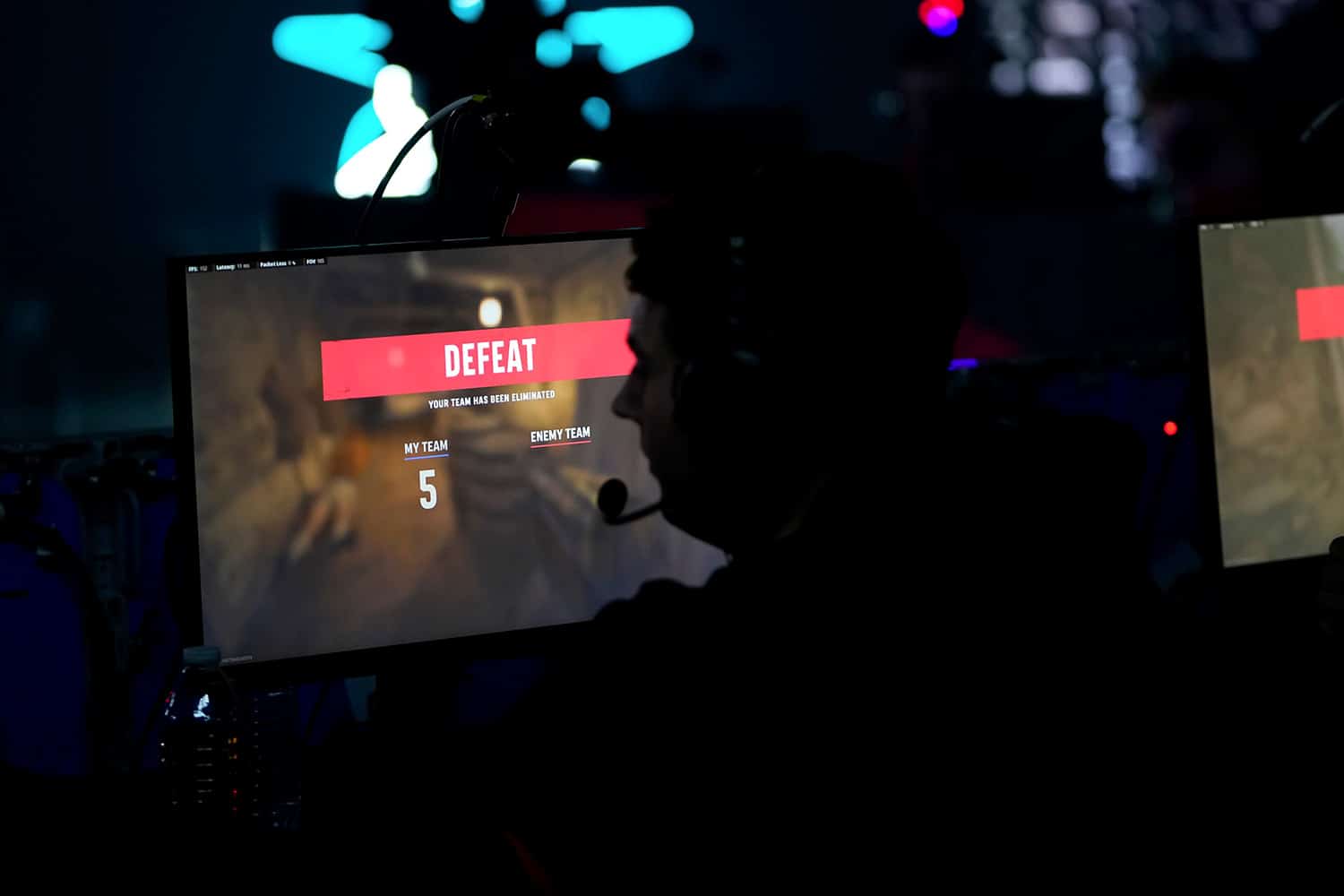 A defeat screen is show in front of a Call of Duty professional player during a tournament after a competitive match.
