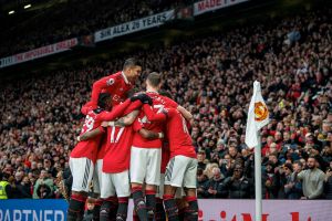 Manchester United players celebrate.