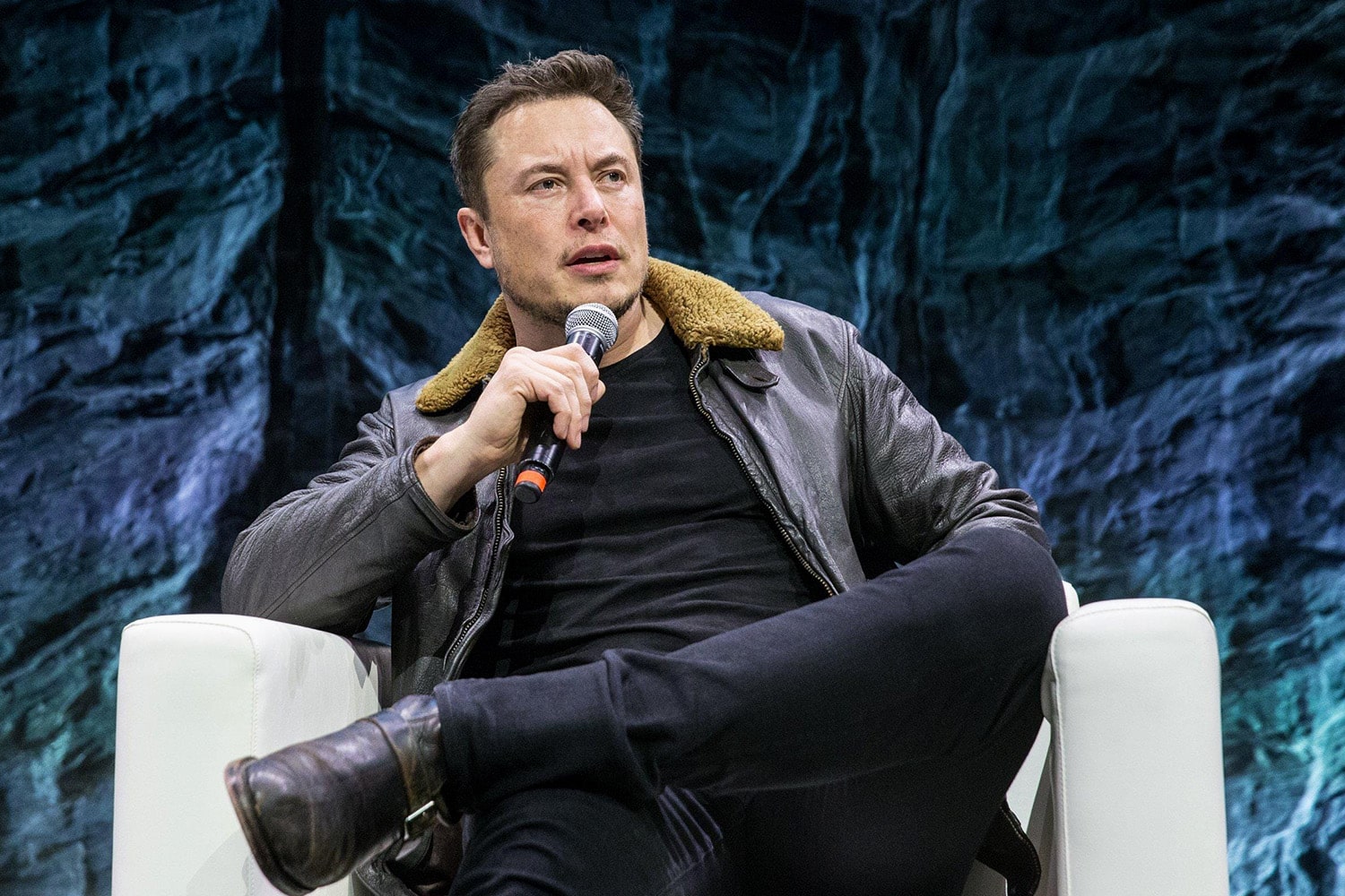 Elon Musk speaks during a panel.