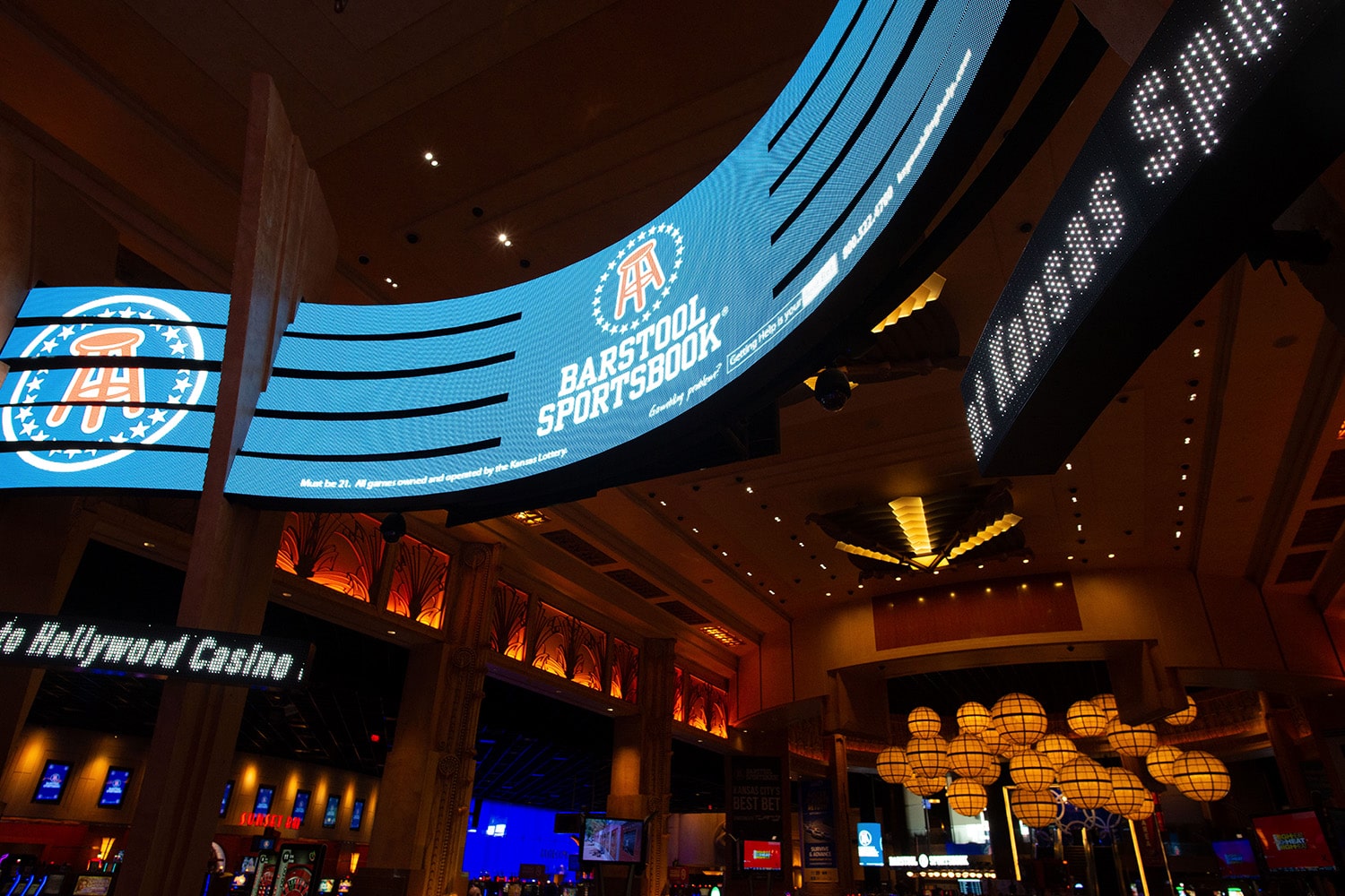 Digital signage for Barstool Sportsbook inside a casino.
