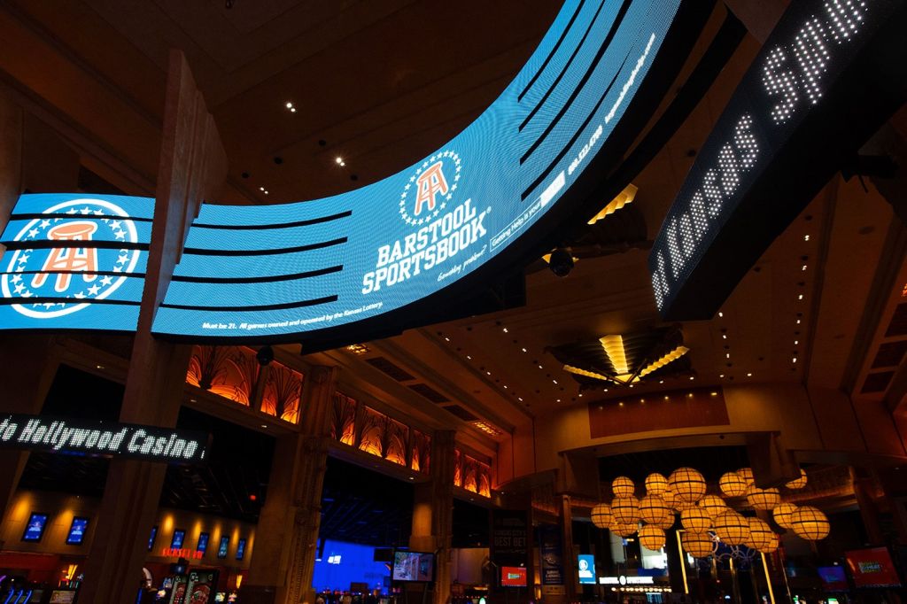 Digital signage for Barstool Sportsbook inside a casino.