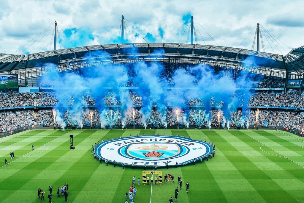 Manchester City FC crest across the field at Etihad Stadium