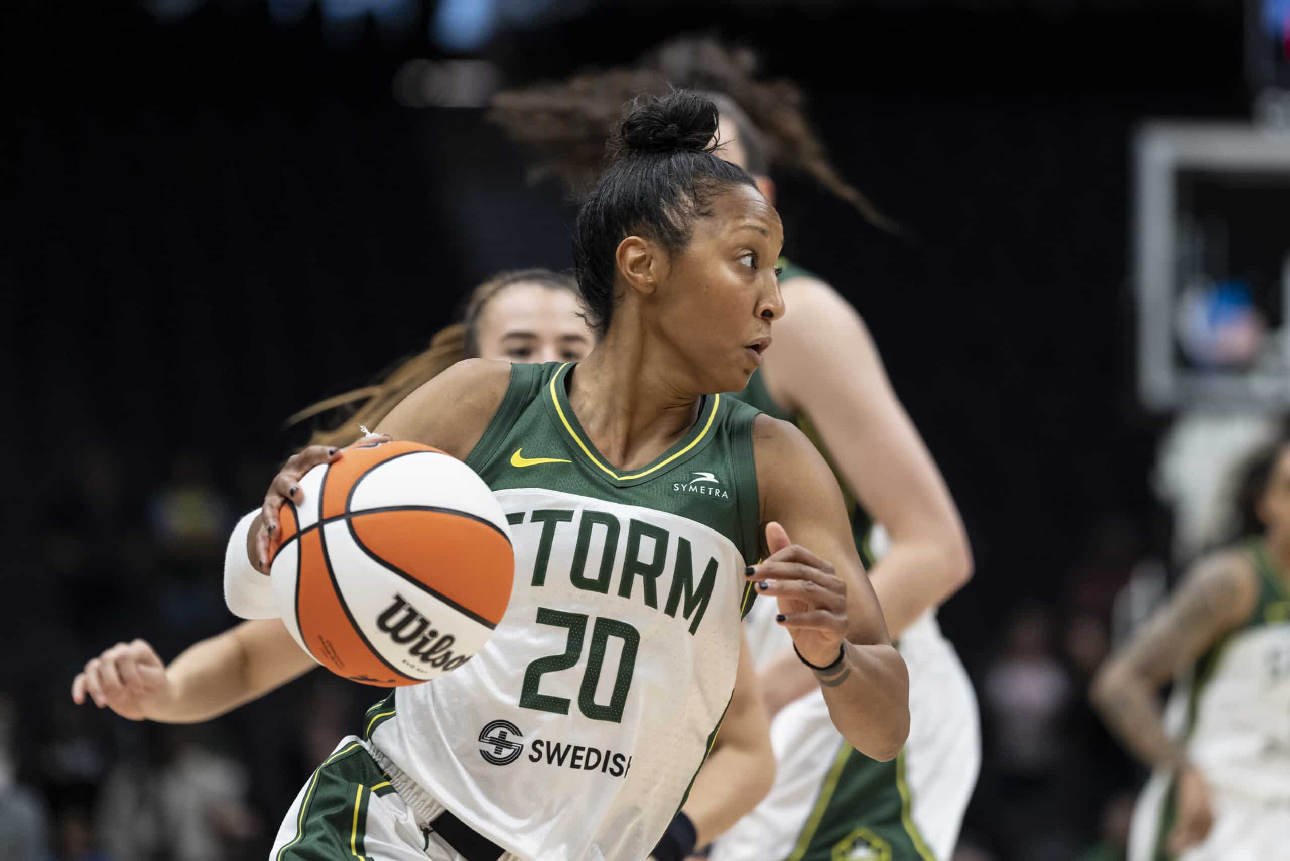 Seattle Storm Briann January driving to the hoop.