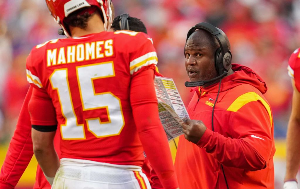 Eric Bieniemy sends instructions to Patrick Mahomes.