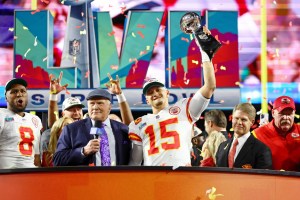 Patrick Mahomes hoists his second Super Bowl trophy.