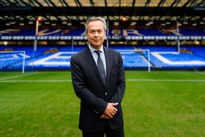 Everton FC owner Farhad Moshiri stands on the pitch at Goodison Park Stadium.