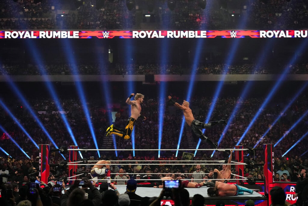 Wrestlers Logan Paul and Ricochet battle during the men's WWE Royal Rumble.