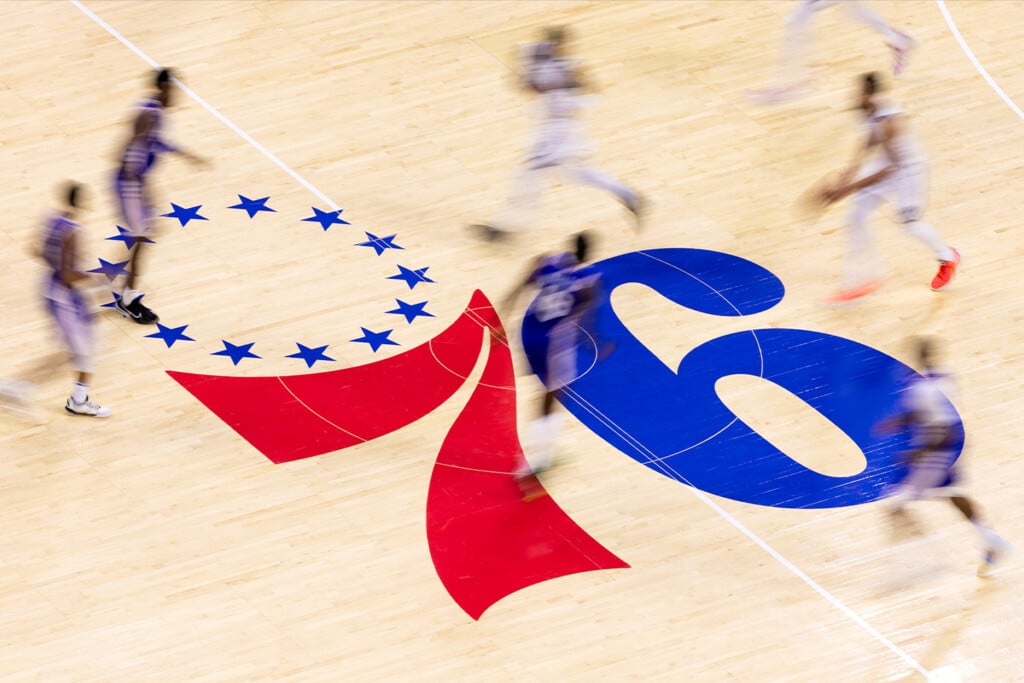 A view of the 76ers court logo mid game
