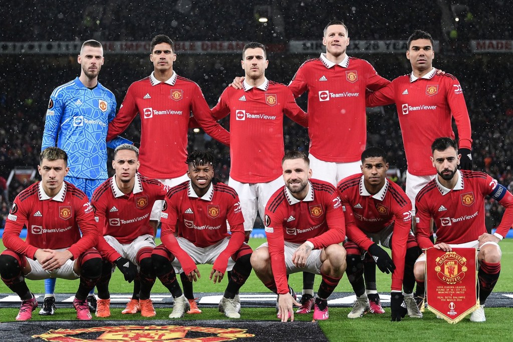Manchester United players pose together before a home match at Old Trafford stadium.