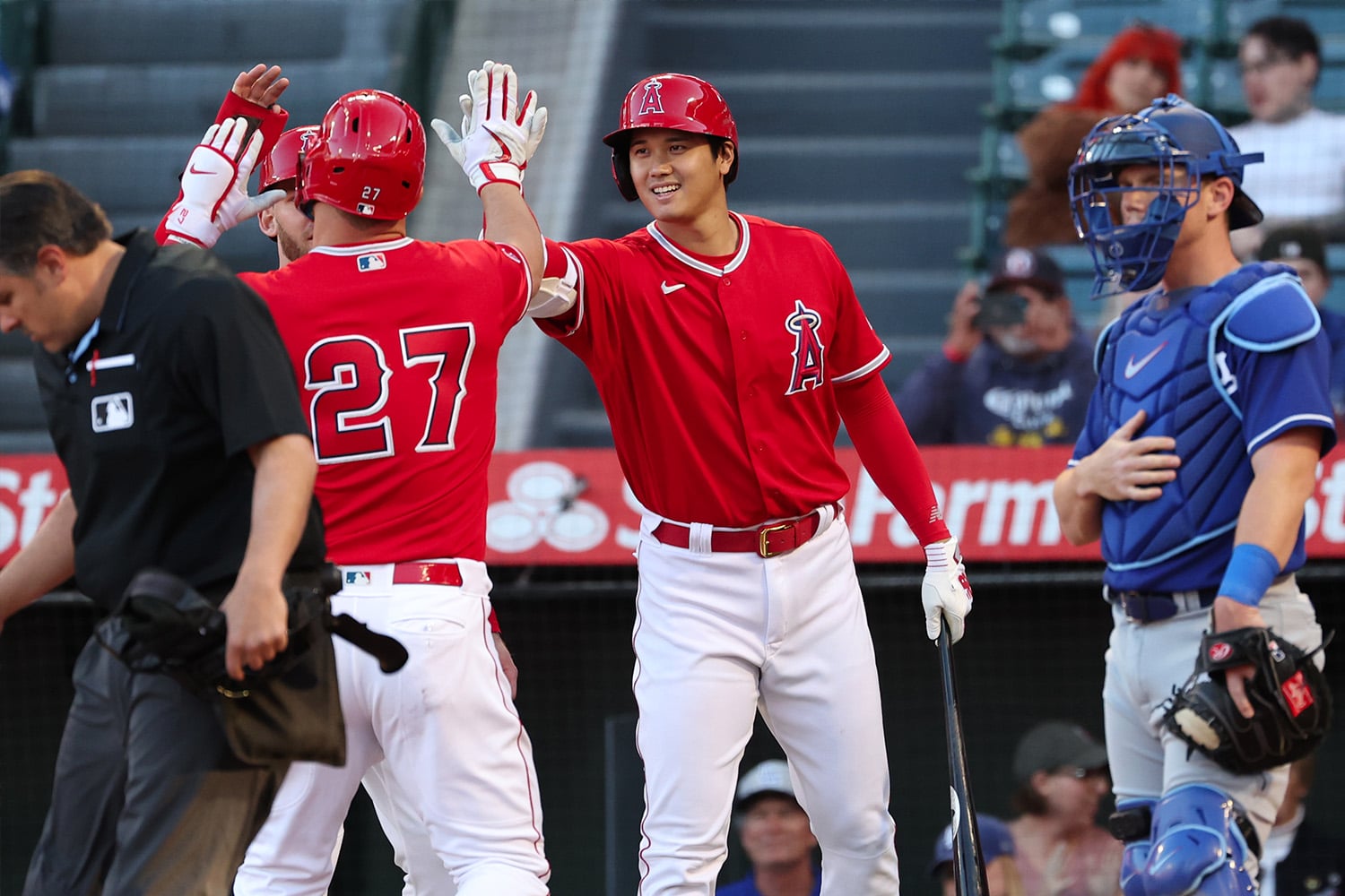 Los Angeles Angels pitcher Shohei Ohtani celebrates with teammates.