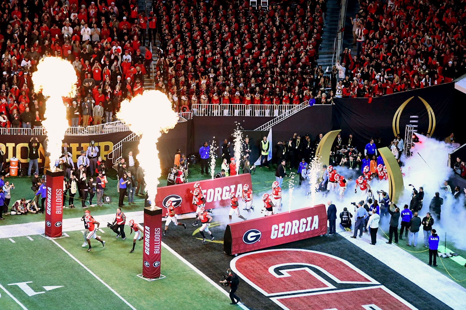 A view of the University of Georgia Bulldogs as they enter the field.