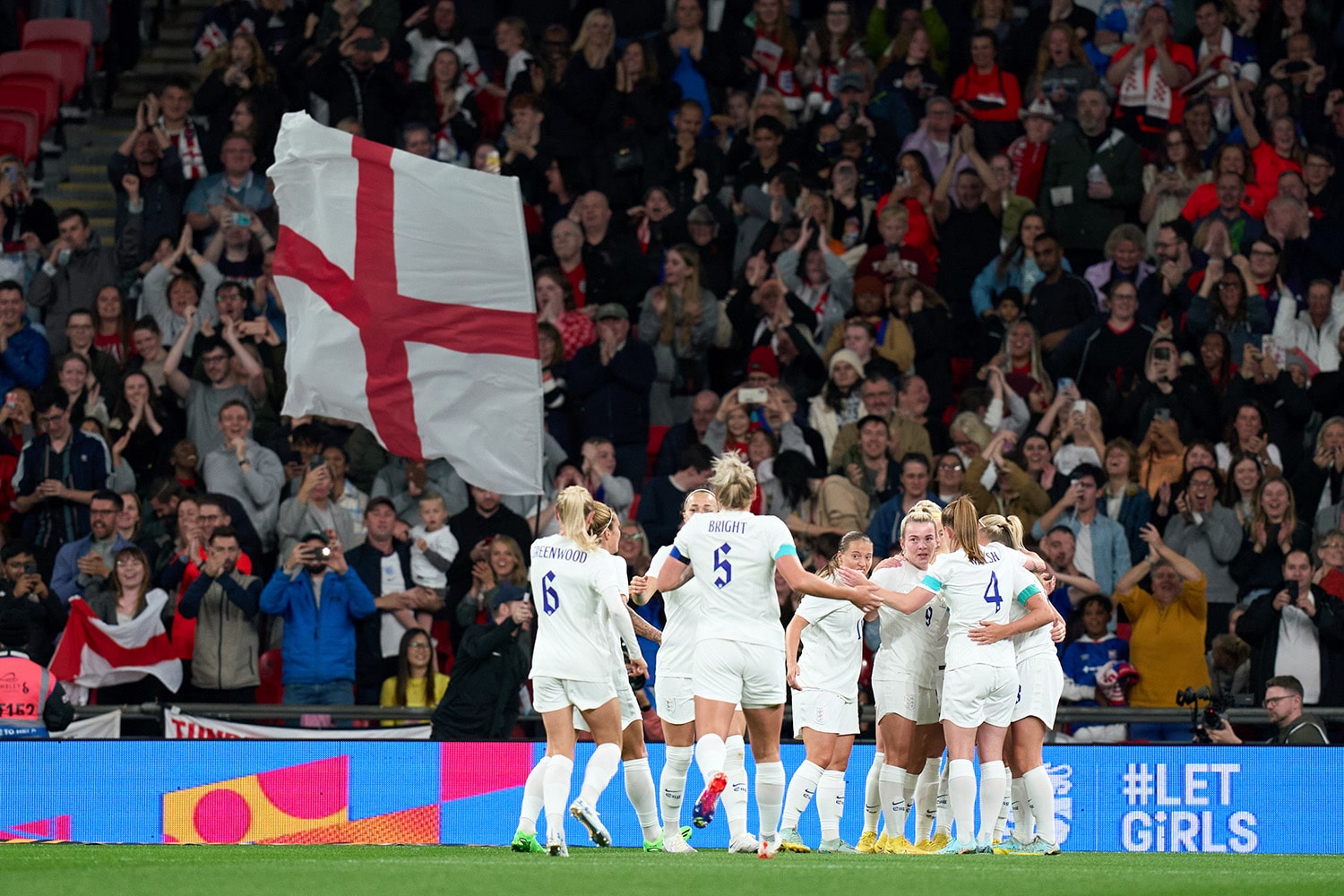 The England Lionesses together during a match at Wembley Stadium.