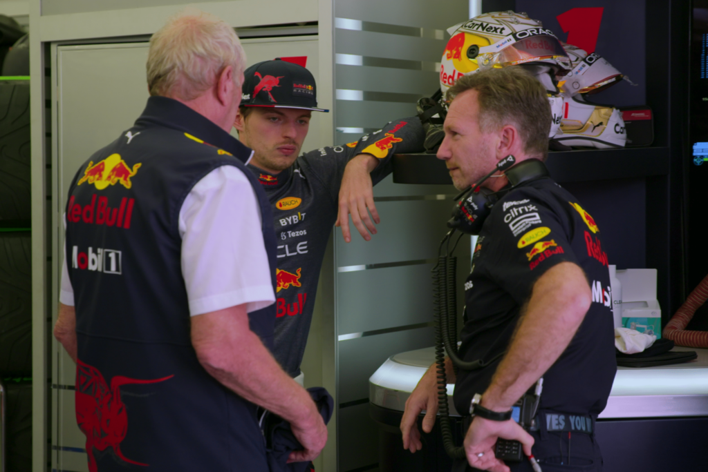 Red Bull's Max Verstappen and Christian Horner having an informal meeting.