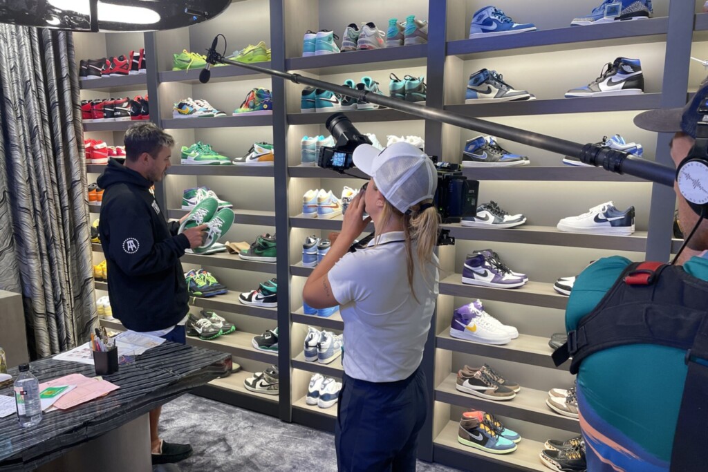 A Netflix crew filming golfer Brooks Koepka showing off the shoes in his closet.