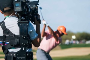 A general view as the documentary team from Netflix Full Swing works with Rickie Fowler on the range prior to the start of the final round of the WM Phoenix Open golf tournament.