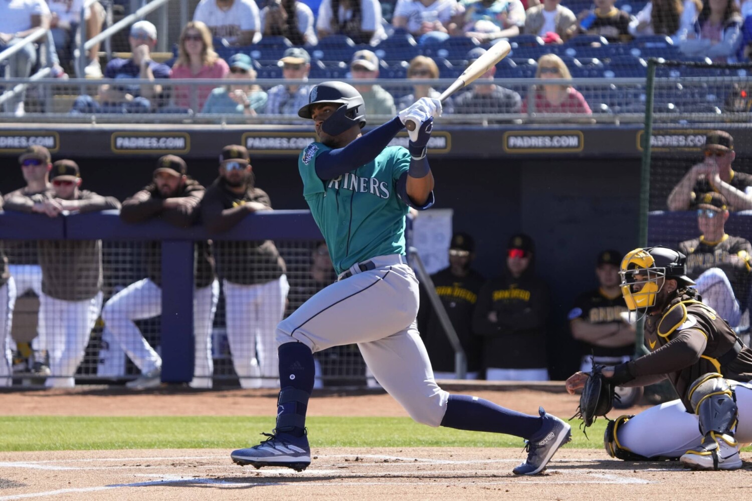 Seattle Mariners outfielder Julio Rodriguez hits during spring training