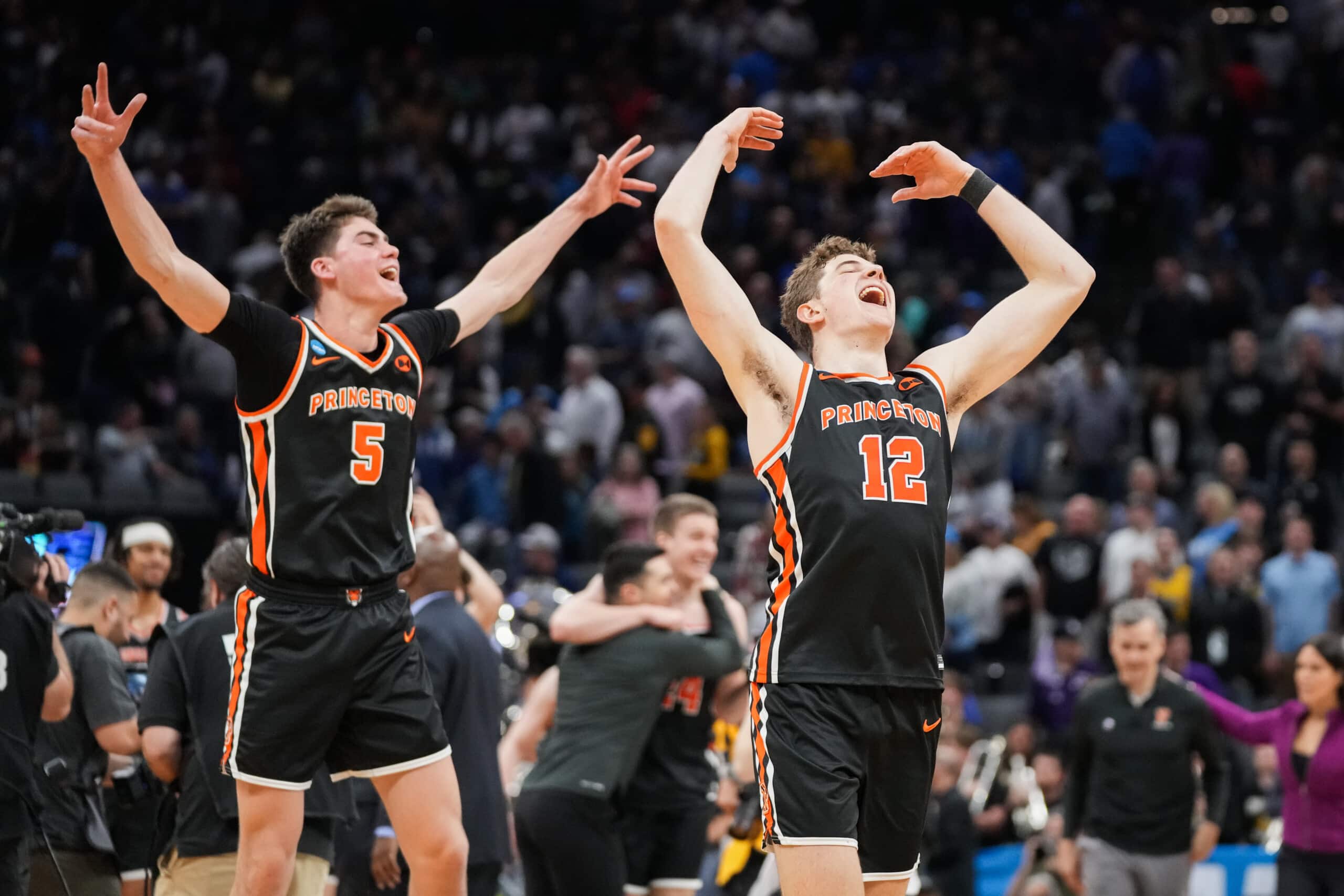 The Princeton Tigers celebrate after defeating the Missouri Tigers.