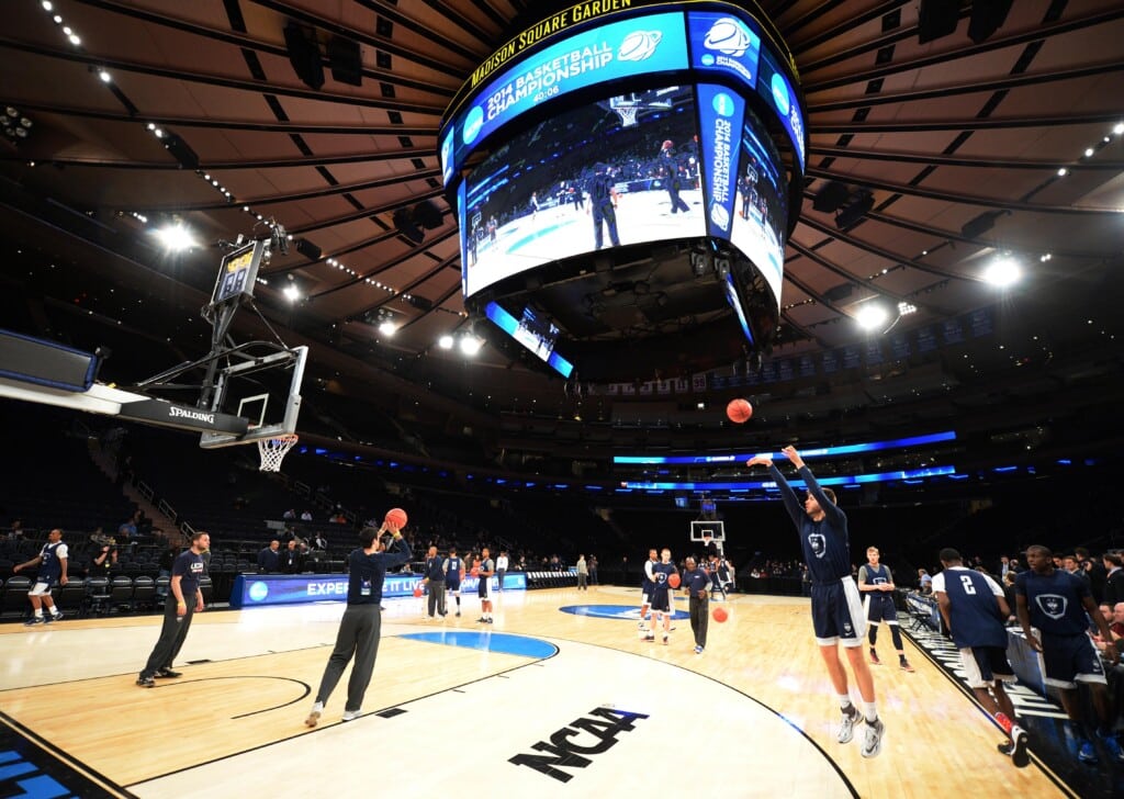 Mar 27, 2014; New York, NY, USA; Connecticut Huskies guard/forward Niels Giffey (5) shoots the ball during practice for the east regional of the 2014 NCAA Tournament at Madison Square Garden.