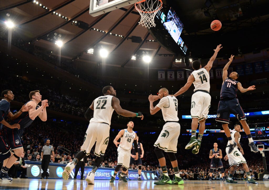 Mar 30, 2014; New York, NY, USA; Connecticut Huskies guard Ryan Boatright (11) shoots the ball over Michigan State Spartans guard Gary Harris (14) during the first half in the finals of the east regional of the 2014 NCAA Mens Basketball Championship tournament at Madison Square Garden.