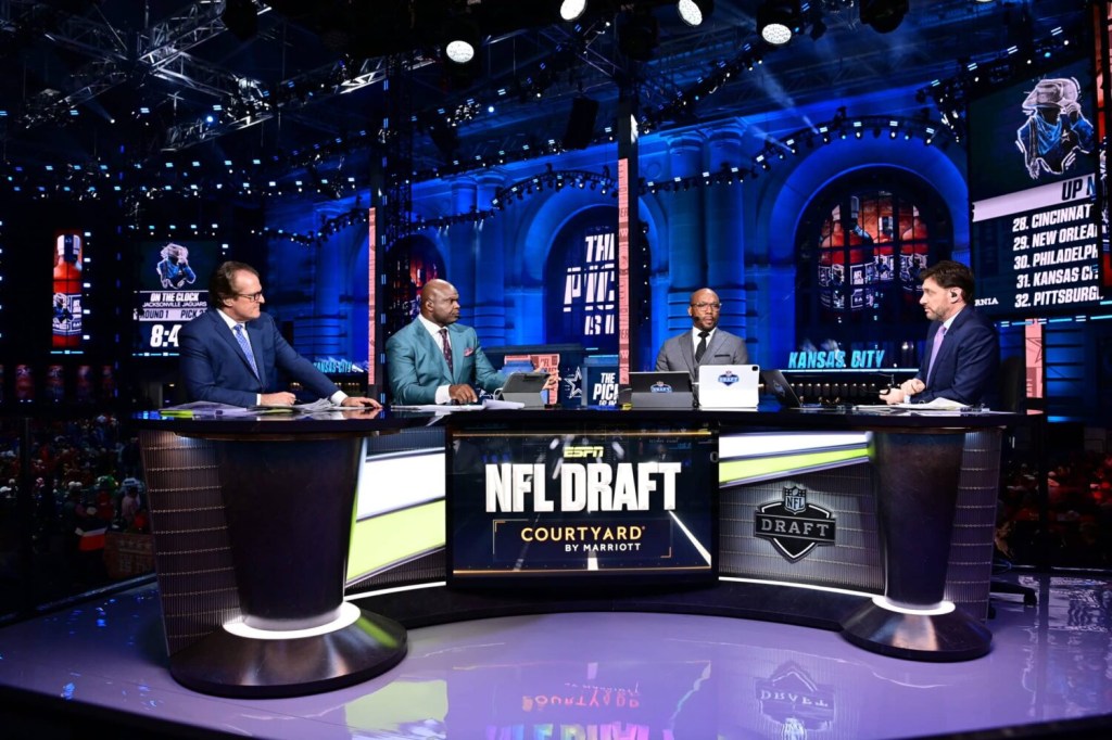 Mel Kiper Jr, Booger McFarland, Louis Riddick and Mike Greenberg on the ESPN set during the 2023 NFL Draft