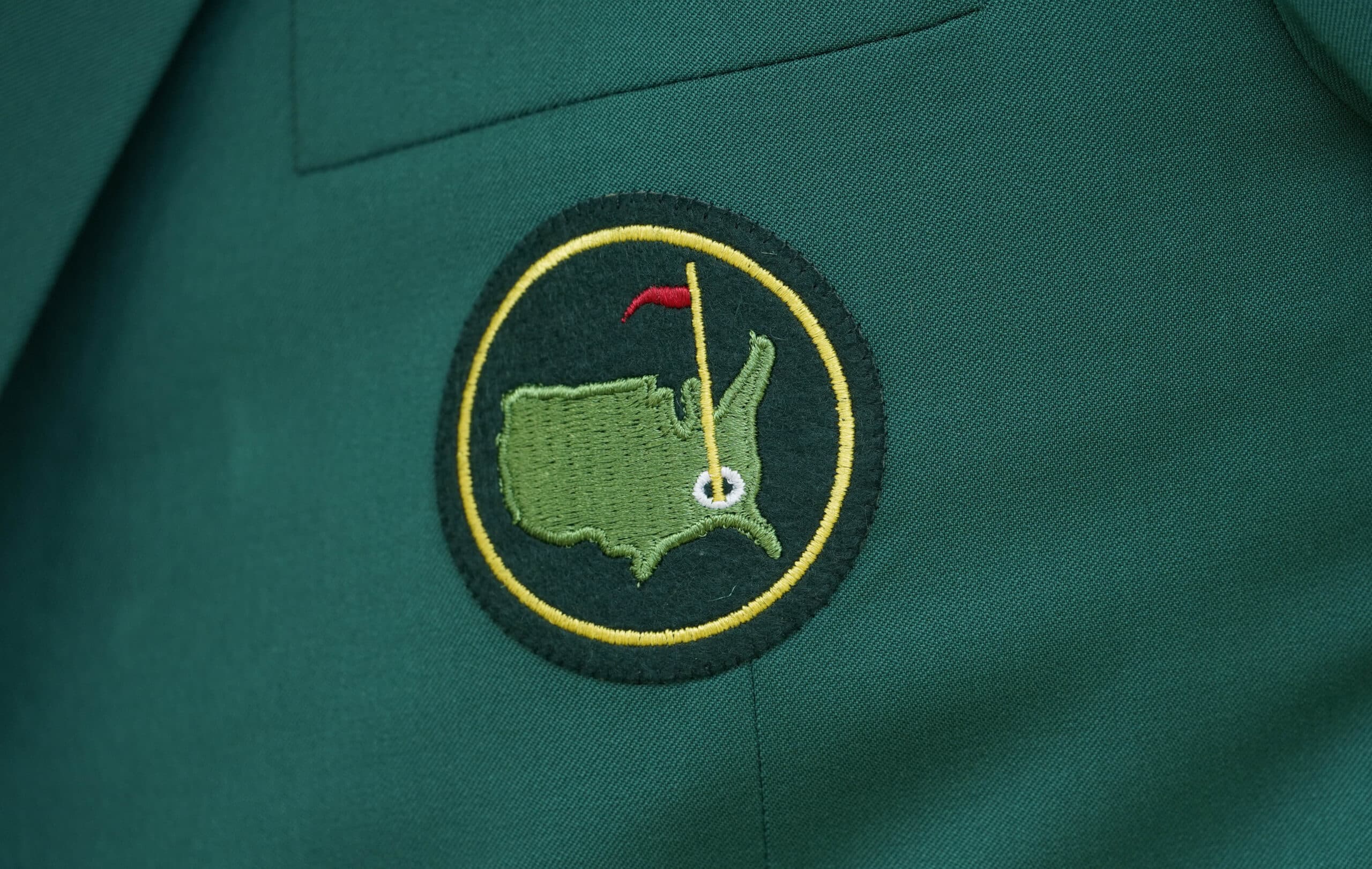 Apr 8, 2021; Augusta, Georgia, USA; Detailed view of a logo on a member's green jacket during the first round of The Masters golf tournament.