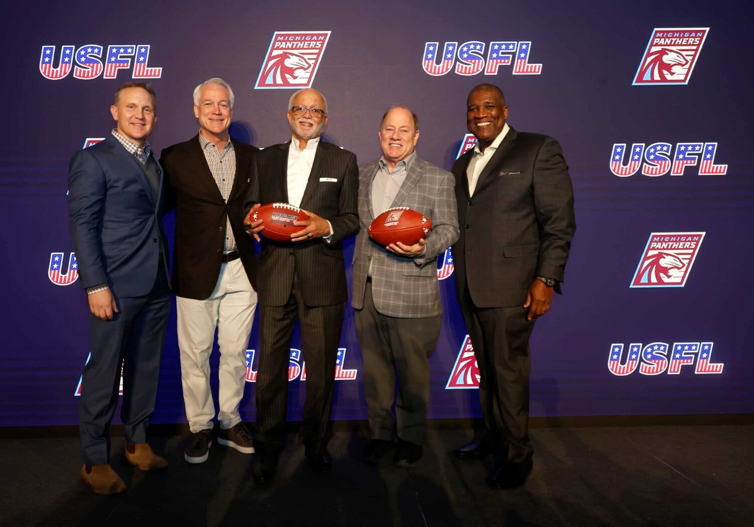 (From left) Fox Sports CEO Eric Shanks, USFL executive vice president Daryl Johnston, Wayne County executive Warren Evans, Detroit Mayor Mike Duggan and Fox Sports' Curt Menefee pose for a photograph after a press conference and announcement on Thursday, Jan. 26, 2023 about the Michigan Panthers of the USFL returning to play at Ford Field in Detroit starting on April 30th. Usfldetroit 012623 Es13