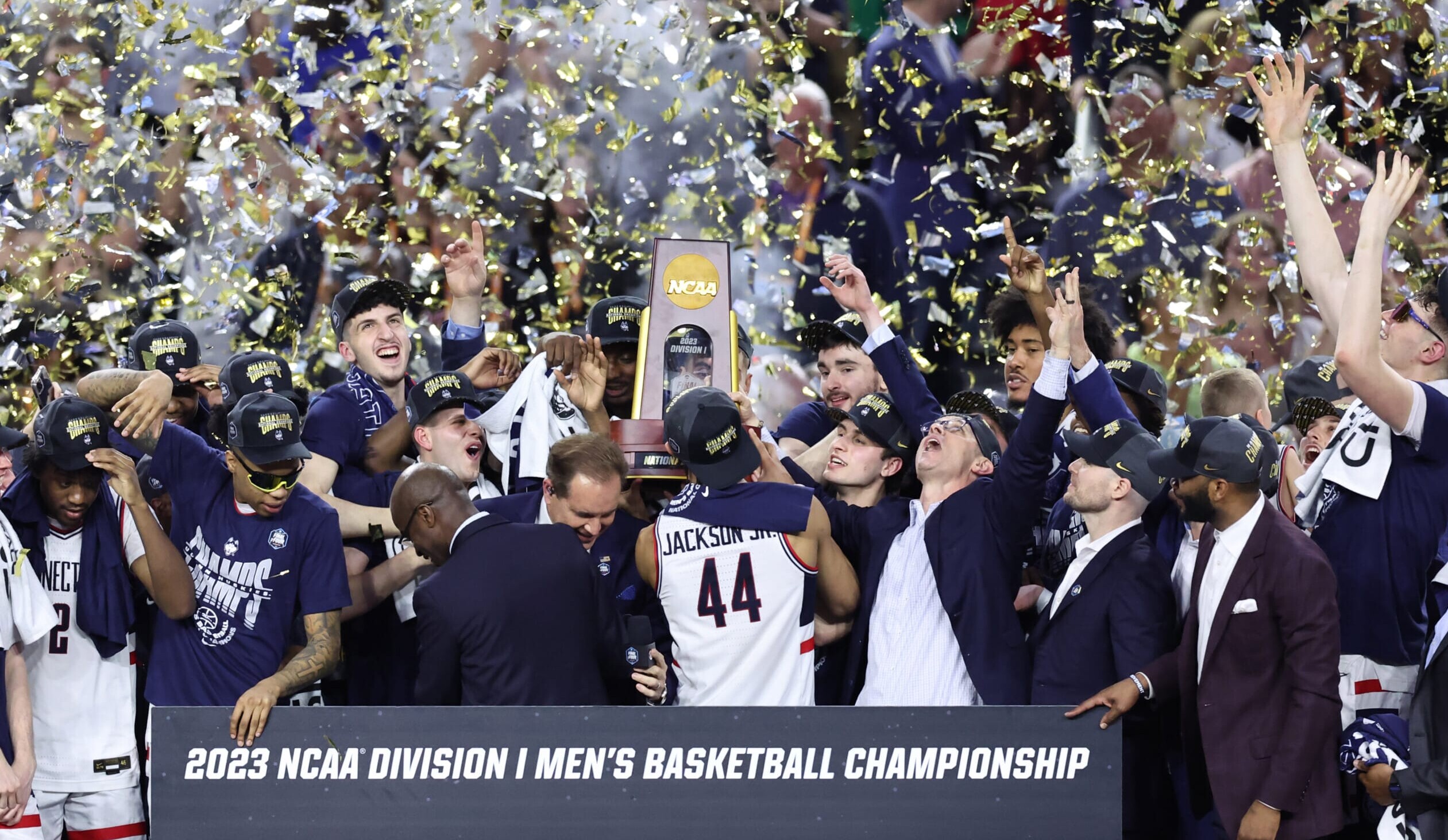 Apr 3, 2023; Houston, TX, USA; Connecticut Huskies players celebrate after defeating the San Diego State Aztecs in the national championship game of the 2023 NCAA Tournament at NRG Stadium.