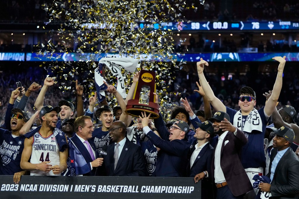 Connecticut Huskies players celebrates after defeating the San Diego State Aztecs in the national championship game of the 2023 NCAA Tournament at NRG Stadium.