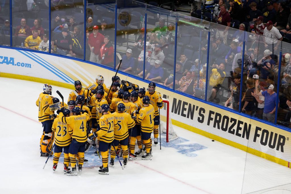 Apr 6, 2023; Tampa, Florida, USA; Quinnipiac celebrates after beating Michigan in the semifinals of the 2023 Frozen Four college ice hockey tournament at Amalie Arena.