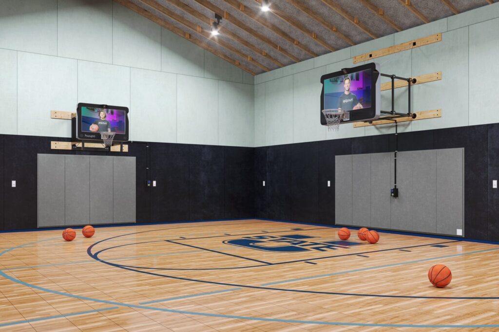 The huupe "smart" basketball hoop in a gym.