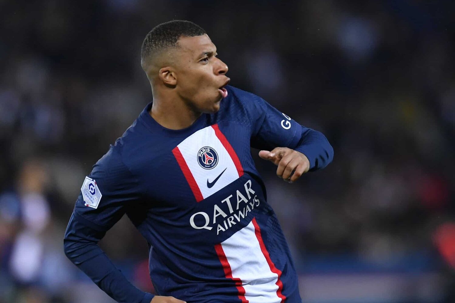 PSG striker Kylian Mbappe celebrates.