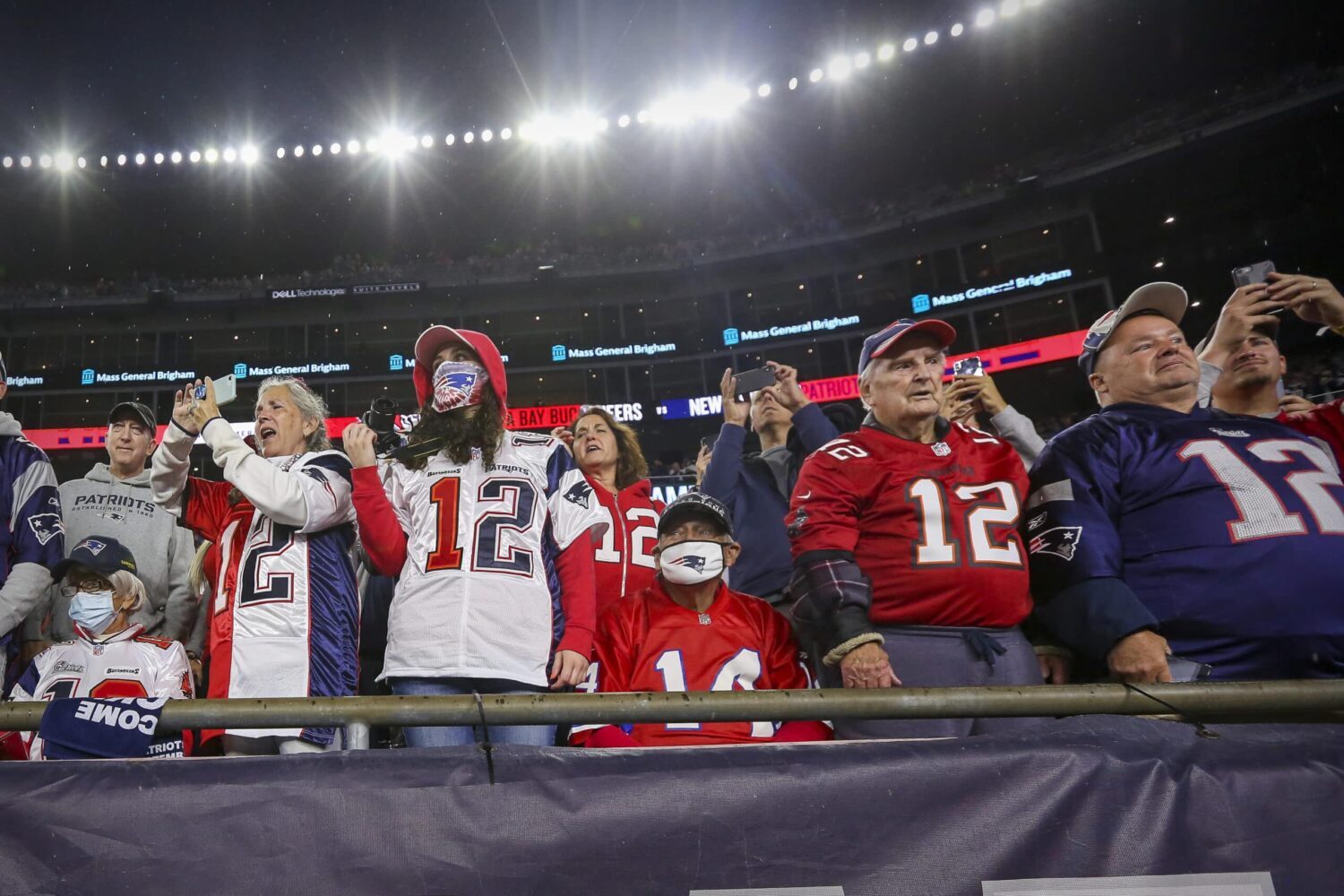 Patriot fans taking in an NFL game.
