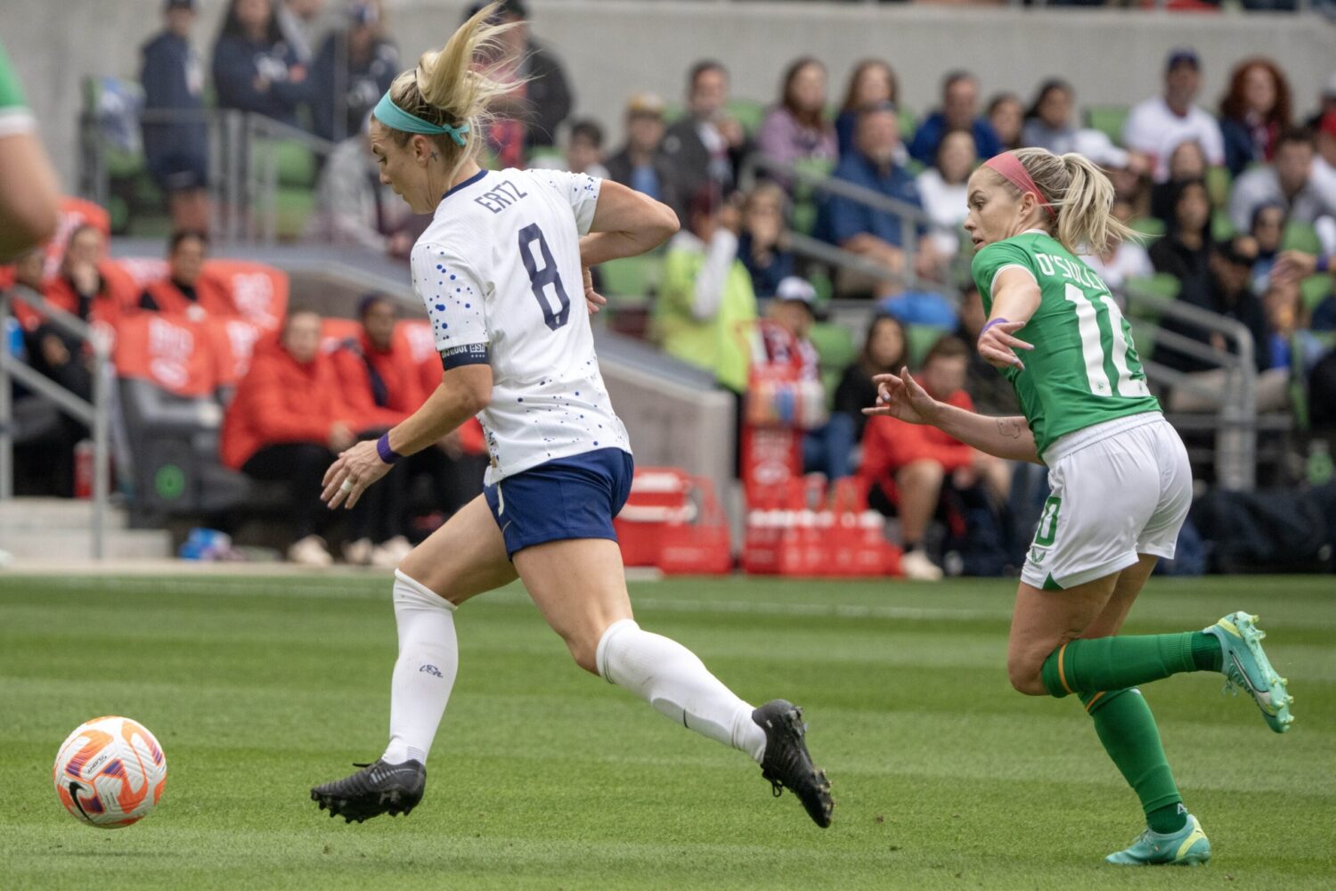 Apr 8, 2023; Austin, Texas, USA; U.S. Women's National Team midfielder Julie Ertz (8) moves the ball against Republic of Ireland Women's National Team midfielder Denise O'Sullivan (10) during the second half at Q2 Stadium.