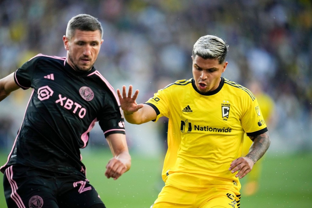 Apr 29, 2023; Columbus, Ohio, United States; Columbus Crew forward Cucho Hernandez (9) fights Inter Miami defender Serhiy Kryvtsov (27) for the ball during the first half of the MLS soccer game between Columbus Crew and Inter Miami at Lower.com Field on Saturday night.