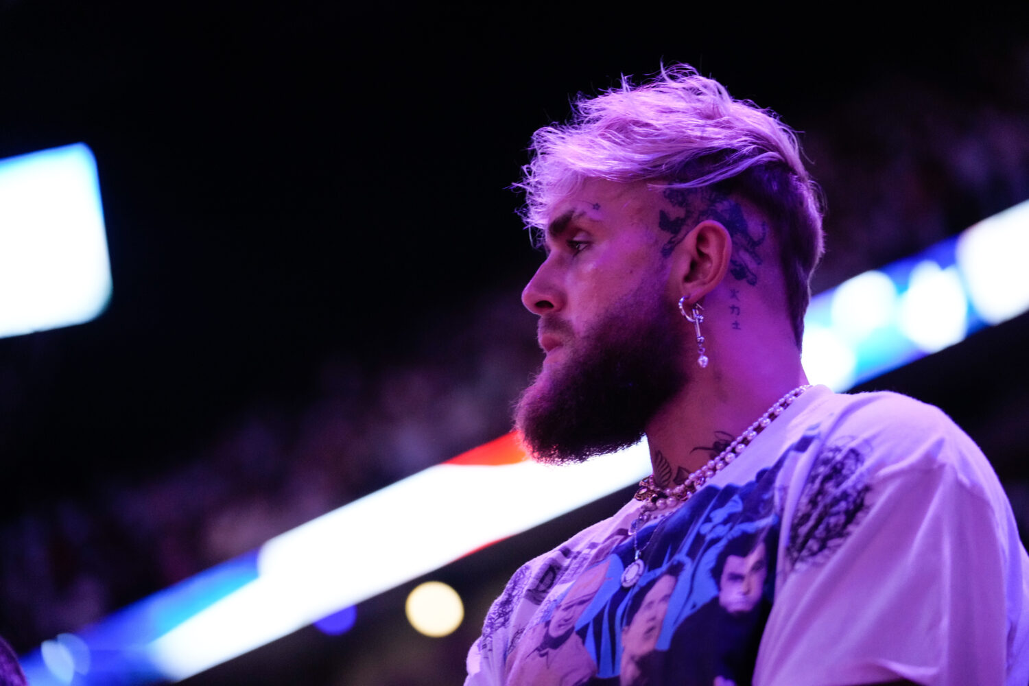 Jake Paul watches a game between the Miami Heat and the New York Knicks during game three of the 2023 NBA playoffs.