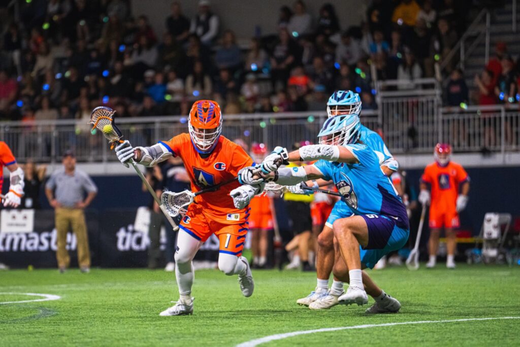 An Archers player drives against an Atlas player during the Premier Lacrosse League Championship Series.